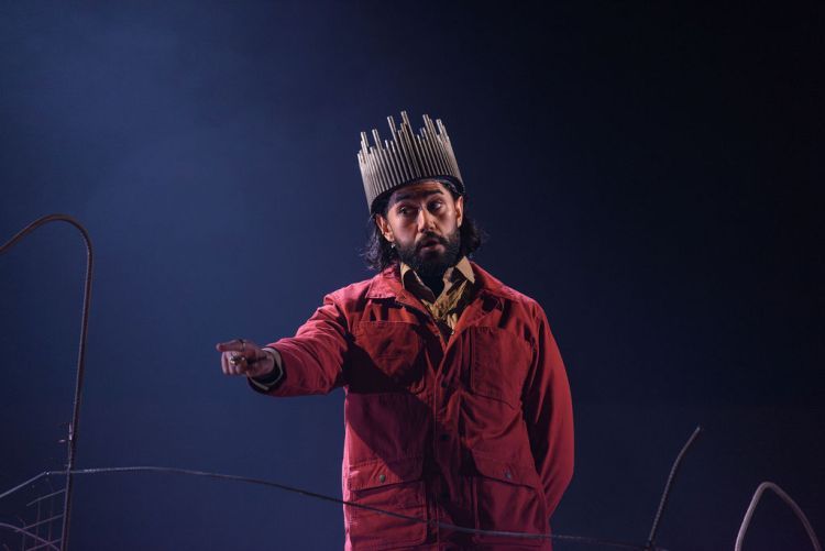 Solo shot of Sachin Krishan Sharma wearing a crown and pointing at someone